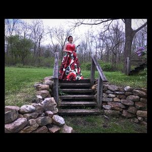 Red flowered Prom dress fits sizes 10-12